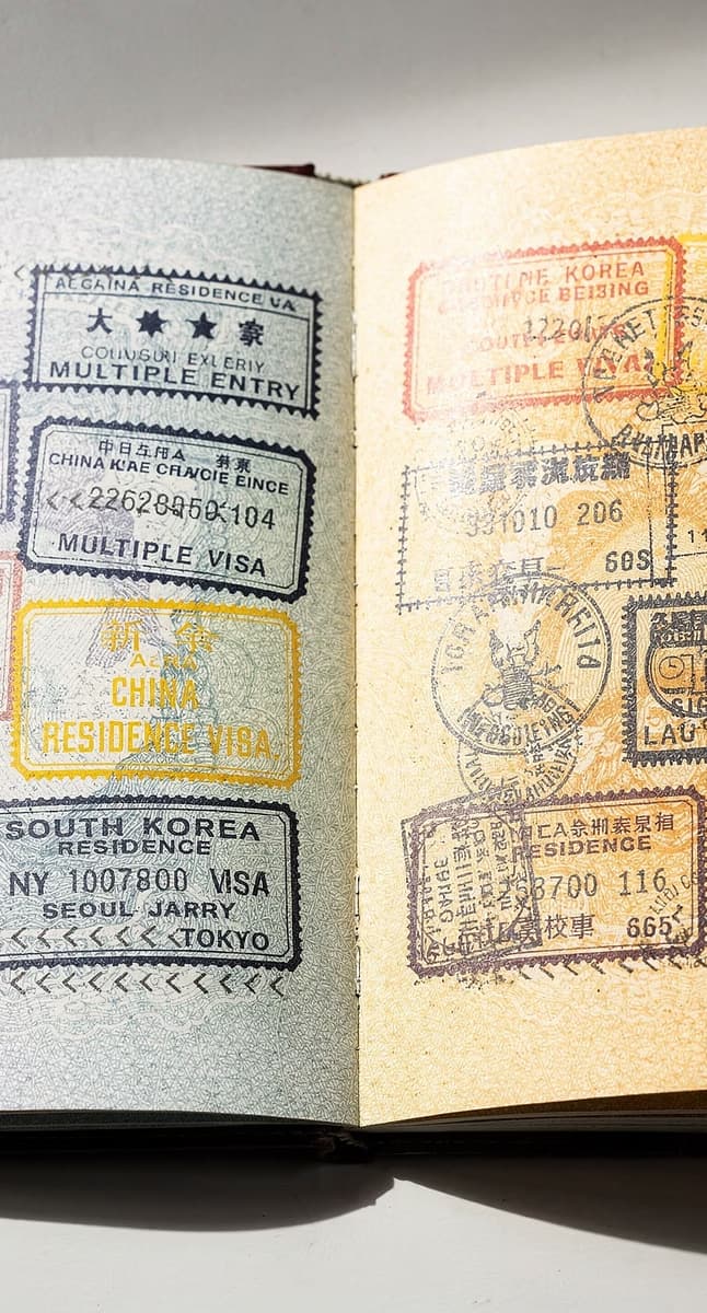 Passport with international visas representing teaching abroad pathways